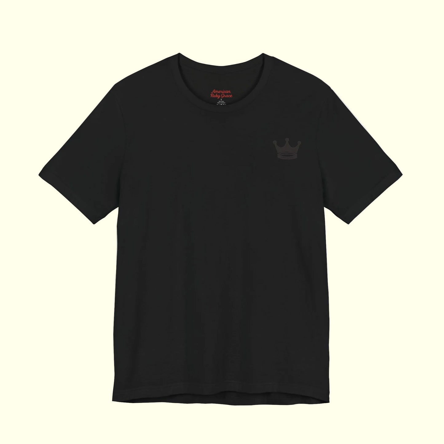 Black t-shirt with Crown + Halos emblem on a white background