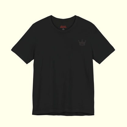 Black t-shirt with Crown + Halos emblem on a white background